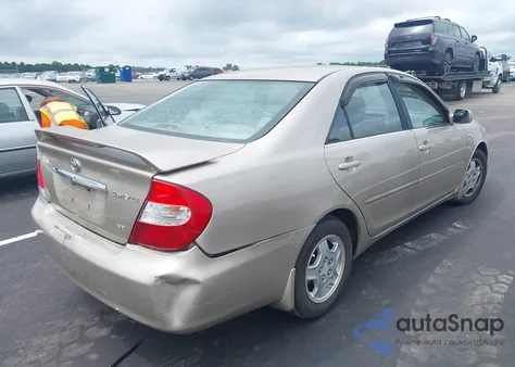 2003 Toyota Camry Le V6 z USA, uszkodzony, nr VIN 4T1BF32K23U046400